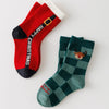 Lot de 5 chaussettes enfant. Modèle mixte : fille et garçon. Motifs de noël : sapin de noël, flocons, renne, père noël. 