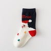 Lot de 5 chaussettes enfant. Modèle mixte : fille et garçon. Motifs de noël : sapin de noël, flocons, renne, père noël. 