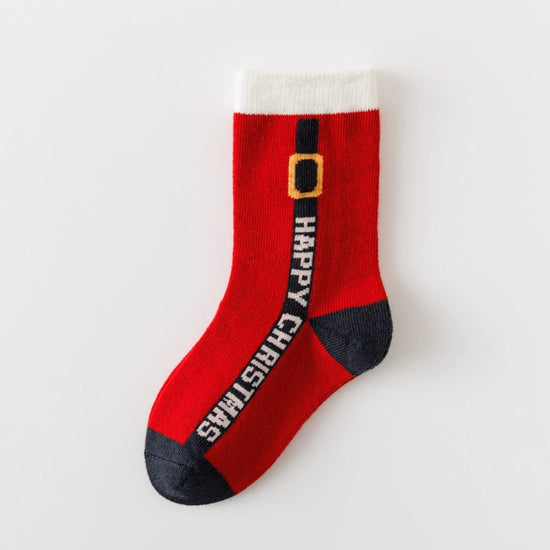 Lot de 5 chaussettes enfant. Modèle mixte : fille et garçon. Motifs de noël : sapin de noël, flocons, renne, père noël. 