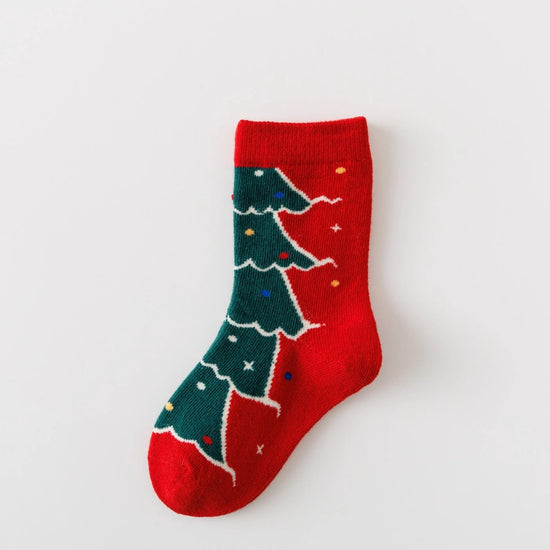 Lot de 5 chaussettes enfant. Modèle mixte : fille et garçon. Motifs de noël : sapin de noël, flocons, renne, père noël. 