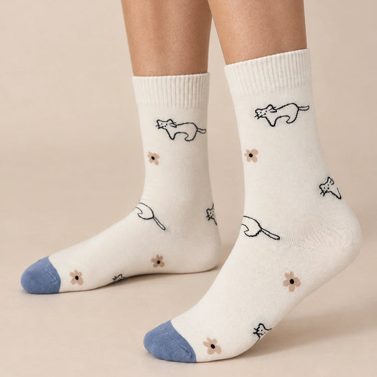 Chaussettes hautes chiens et chats pour femme, vendues à l’unité. Deux motifs animaliers originaux, matière douce et stretch, taille unique 35-41.