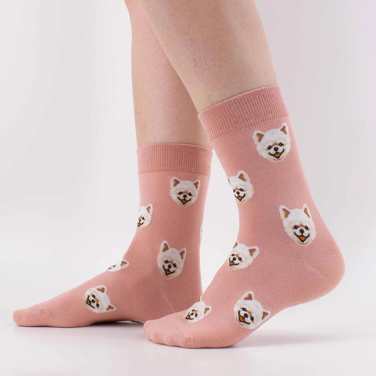 Chaussettes hautes fond rose pâle motif tête de chien Spitz