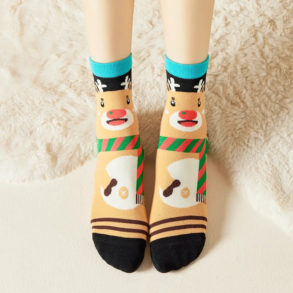 Chaussettes de Noël motif renne avec écharpe coloris noir beige et bleu 