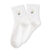 Chaussette haute unie avec marguerite brodée.