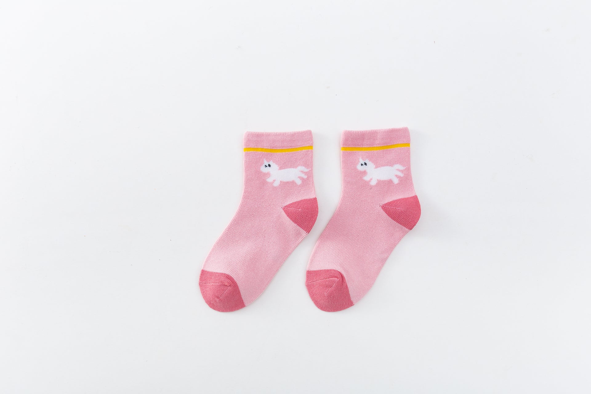 Chaussettes montantes, fond rose, motif  licornes. Pour bébé et enfant (du 12 mois au 12 ans).