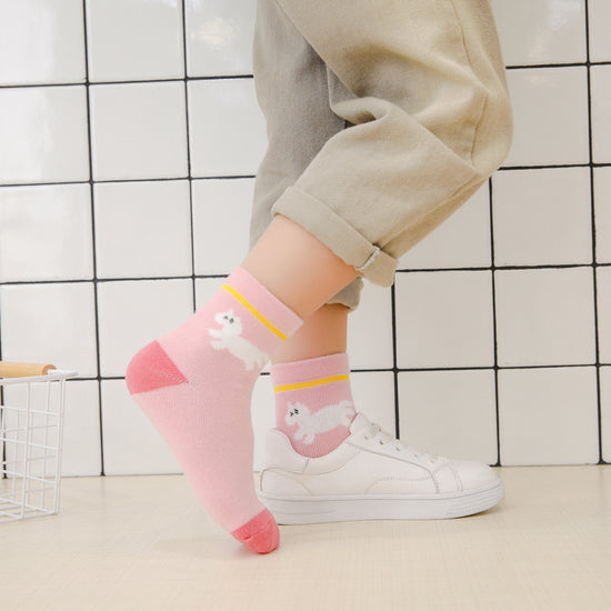 Chaussettes montantes, fond rose, motif licornes. Pour bébé et enfant (du 12 mois au 12 ans).