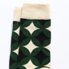 Chaussettes hautes pour homme. Motif rosace vert, noir et blanc. 