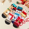Coffret de 4 chaussettes hautes costume de Noël : Père Noël, Bonhomme de Neige, Renne et Ours