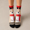 Coffret de 4 chaussettes hautes costume de Noël : Père Noël, Bonhomme de Neige, Renne et Ours