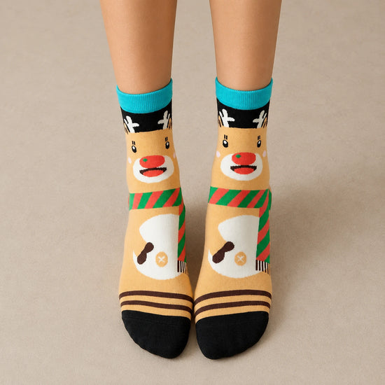 Coffret de 4 chaussettes hautes costume de Noël : Père Noël, Bonhomme de Neige, Renne et Ours