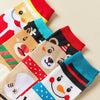 Coffret de 4 chaussettes hautes costume de Noël : Père Noël, Bonhomme de Neige, Renne et Ours