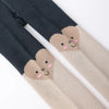 Lot de 2 collants fille : collant marron clair avec cœur sur le genou + collant gris chiné clair. Doux, confortables et disponibles en 12-24 mois, 2-4 ans et 5-8 ans. Un duo pratique et mignon pour le quotidien.