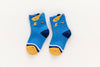 Lot de 5 chaussettes enfant bleues à motifs dinosaures. Confortables, douces et ludiques. Tailles de 12 mois à 12 ans. Parfait pour les petits explorateurs.