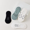 Lot de 4 socquettes invisibles en coton avec motif smiley ou message. Fond noir, blanc ou bleu. Confortables, discrètes et parfaites avec des baskets.