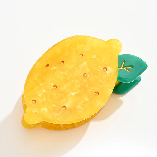 Pince cheveux en forme de citron, coloris jaune et vert