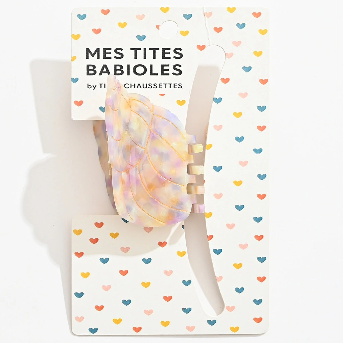 Pince cheveux coquillage femme en acétate nacré, 7 cm. Accessoire coiffure élégant et estival, idéal pour cheveux fins à normaux.