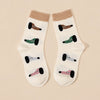 Chaussettes hautes chiens et chats pour femme, vendues à l’unité. Deux motifs animaliers originaux, matière douce et stretch, taille unique 35-41.