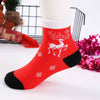 Chaussettes de Noël pour enfants. Coloris rouge, blanc et vert. Motif renne. Idéales pour les fêtes. Pour bébés et enfants (du 12 mois au 12 ans).