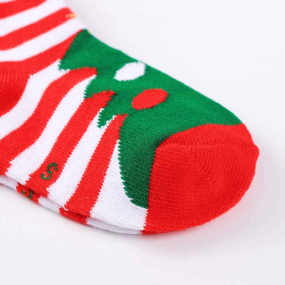 Chaussettes de Noël pour enfants. Coloris rouge, blanc et vert. Motif sapin. Idéales pour les fêtes. Pour bébés et enfants (du 12 mois au 12 ans).